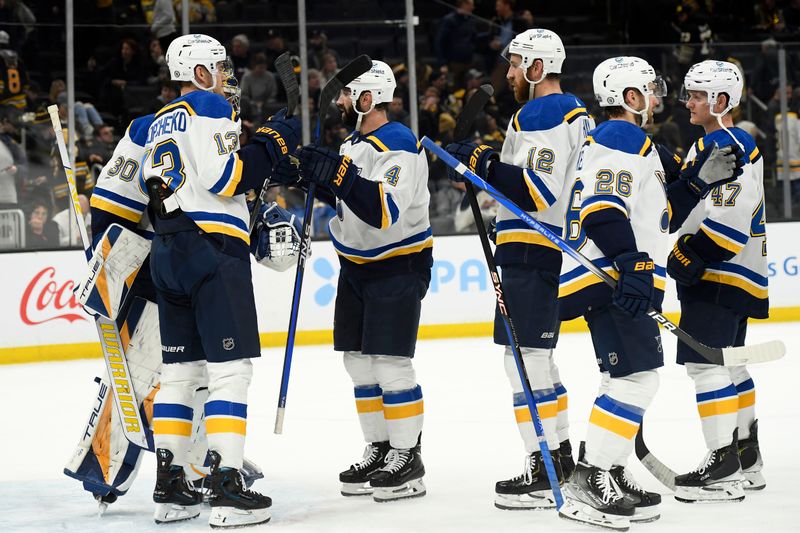 Mar 11, 2024; Boston, Massachusetts, USA;  The St. Louis Blues celebrate after defeating the Boston Bruins at TD Garden. Mandatory Credit: Bob DeChiara-USA TODAY Sports