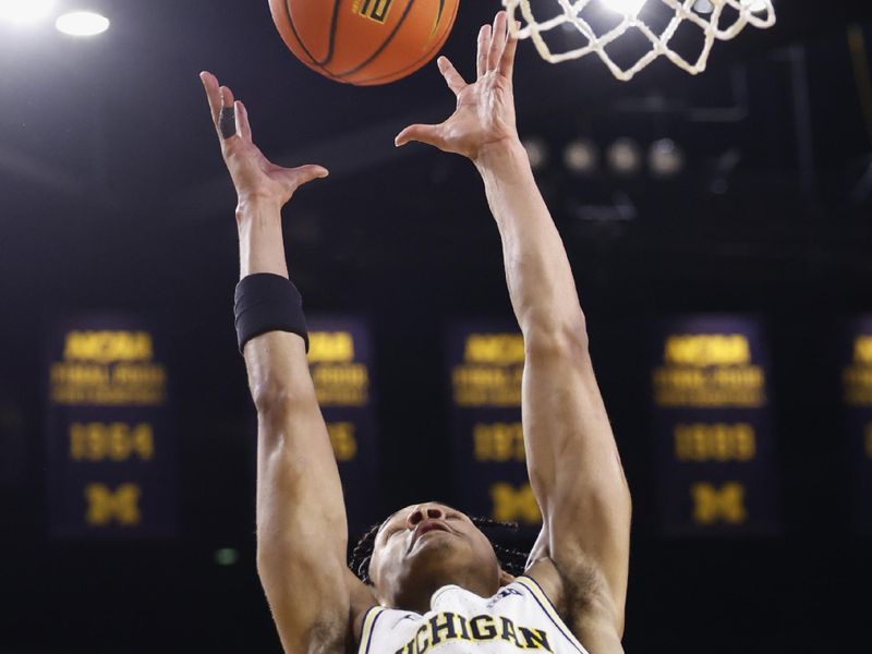 Feb 8, 2023; Ann Arbor, Michigan, USA;  Michigan Wolverines guard Kobe Bufkin (2) grabs the rebound in the second half against the Nebraska Cornhuskers at Crisler Center. Mandatory Credit: Rick Osentoski-USA TODAY Sports