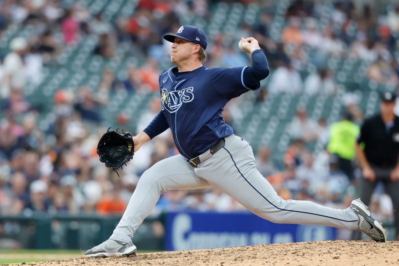 Jul 9, 2025; Detroit, Michigan, USA;  Tampa Bay Rays pitcher Garrett Cleavinger (60) pitches in the seventh inning against the Detroit Tigers at Comerica Park. Mandatory Credit: Rick Osentoski-Imagn Images