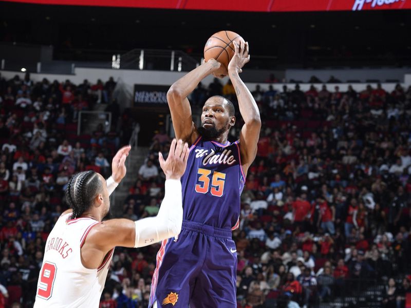 HOUSTON, TX - FEBRUARY 23:  Kevin Durant #35 of the Phoenix Suns shoots the ball during the game against the Houston Rockets on February 23, 2024 at the Toyota Center in Houston, Texas. NOTE TO USER: User expressly acknowledges and agrees that, by downloading and or using this photograph, User is consenting to the terms and conditions of the Getty Images License Agreement. Mandatory Copyright Notice: Copyright 2024 NBAE (Photo by Logan Riely/NBAE via Getty Images)