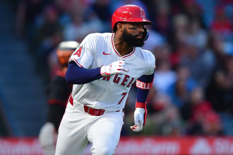 Apr 23, 2024; Anaheim, California, USA; Los Angeles Angels right fielder Jo Adell (7) runs after hitting an RBI single against the Baltimore Orioles during the third inning at Angel Stadium. Mandatory Credit: Gary A. Vasquez-USA TODAY Sports