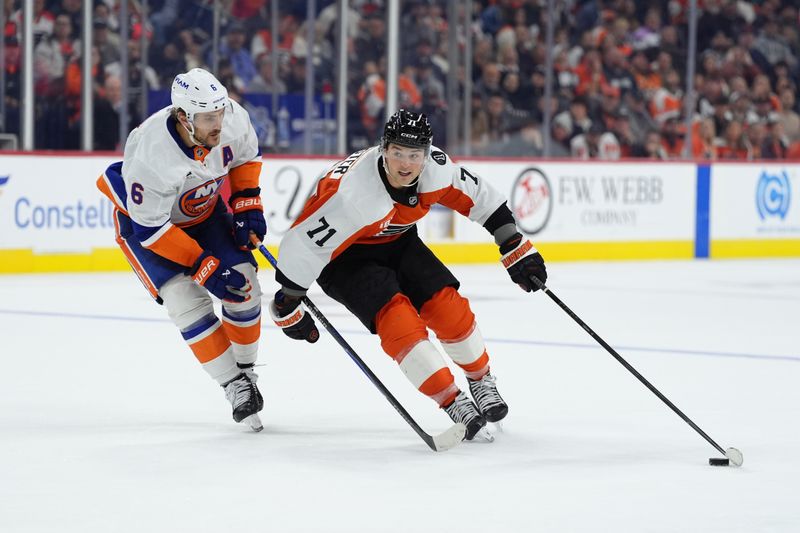 Oct 25, 2025; Philadelphia, Pennsylvania, USA; Philadelphia Flyers right wing Tyson Foerster (71) controls the puck against New York Islanders defenseman Ryan Pulock (6) in overtime at Xfinity Mobile Arena. Mandatory Credit: Kyle Ross-Imagn Images