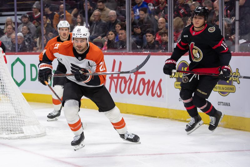 Nov 14, 2024; Ottawa, Ontario, CAN; Philadelphia Flyers center Scott Laughton (21) follows the puck as he stakes past Ottawa Senators center Tim Stutzle (18) in the first period at the Canadian Tire Centre. Mandatory Credit: Marc DesRosiers-Imagn Images