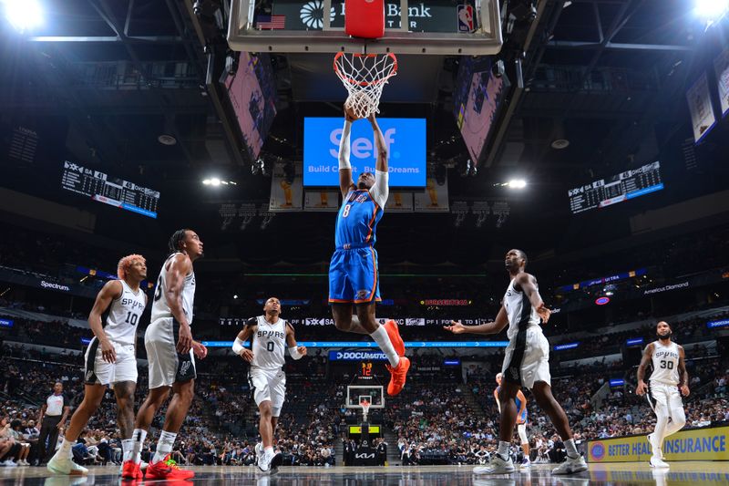 SAN ANTONIO, TX - OCTOBER 7: Jalen Williams #8 of the Oklahoma City Thunder drives to the basket during the game against the San Antonio Spurs during a NBA preseason game on October 7, 2024 at the Frost Bank Center in San Antonio, Texas. NOTE TO USER: User expressly acknowledges and agrees that, by downloading and or using this photograph, user is consenting to the terms and conditions of the Getty Images License Agreement. Mandatory Copyright Notice: Copyright 2024 NBAE (Photos by Michael Gonzales/NBAE via Getty Images)