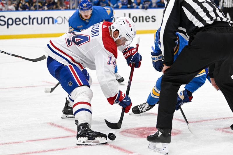 Nov 4, 2023; St. Louis, Missouri, USA; Montreal Canadiens center Nick Suzuki (14) with a face-off against the St. Louis Blues during the second period at Enterprise Center. Mandatory Credit: Jeff Le-USA TODAY Sports