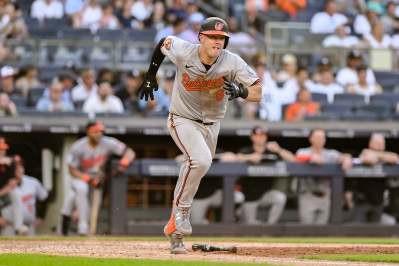 Jun 20, 2024; Bronx, New York, USA; Baltimore Orioles first baseman Ryan Mountcastle (6) hits a double against the New York Yankees during the eighth inning at Yankee Stadium. Mandatory Credit: John Jones-USA TODAY Sports