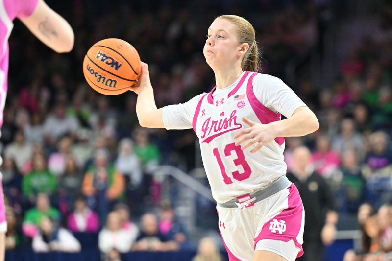 Feb 4, 2024; South Bend, Indiana, USA; Notre Dame Fighting Irish guard Anna Dewolfe (13) passes the ball in the second half against the Pittsburgh Panthers at the Purcell Pavilion. Mandatory Credit: Matt Cashore-USA TODAY Sports