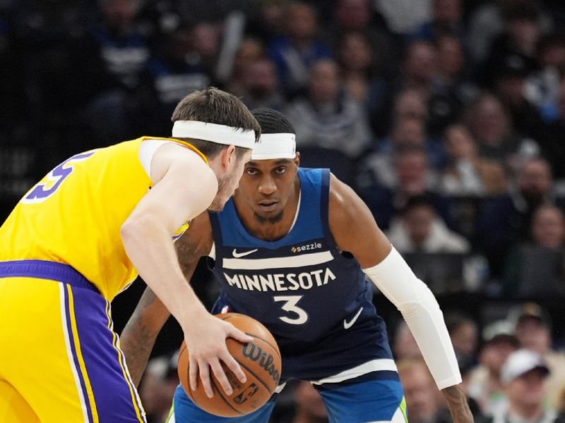 MINNEAPOLIS, MN -  DECEMBER 13: Jaden McDaniels #3 of the Minnesota Timberwolves defends during the game against the Los Angeles Lakers on December 13, 2024 at Target Center in Minneapolis, Minnesota. NOTE TO USER: User expressly acknowledges and agrees that, by downloading and or using this Photograph, user is consenting to the terms and conditions of the Getty Images License Agreement. Mandatory Copyright Notice: Copyright 2024 NBAE (Photo by Jordan Johnson/NBAE via Getty Images)