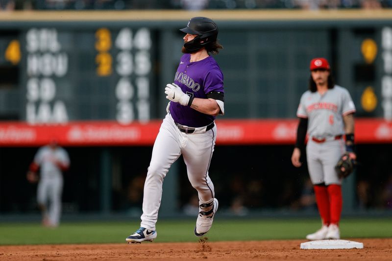 Jun 3, 2024; Denver, Colorado, USA; Colorado Rockies second baseman Brendan Rodgers (7) rounds the bases on a solo home run in the third inning against the Cincinnati Reds at Coors Field. Mandatory Credit: Isaiah J. Downing-USA TODAY Sports