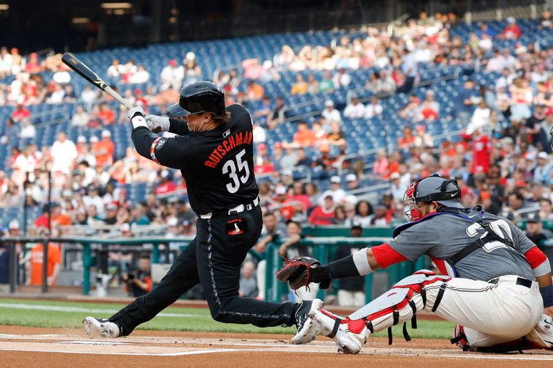 May 7, 2024; Washington, District of Columbia, USA; Baltimore Orioles catcher Adley Rutschman (35) singles against the Washington Nationals during the first inning at Nationals Park. Mandatory Credit: Geoff Burke-USA TODAY Sports