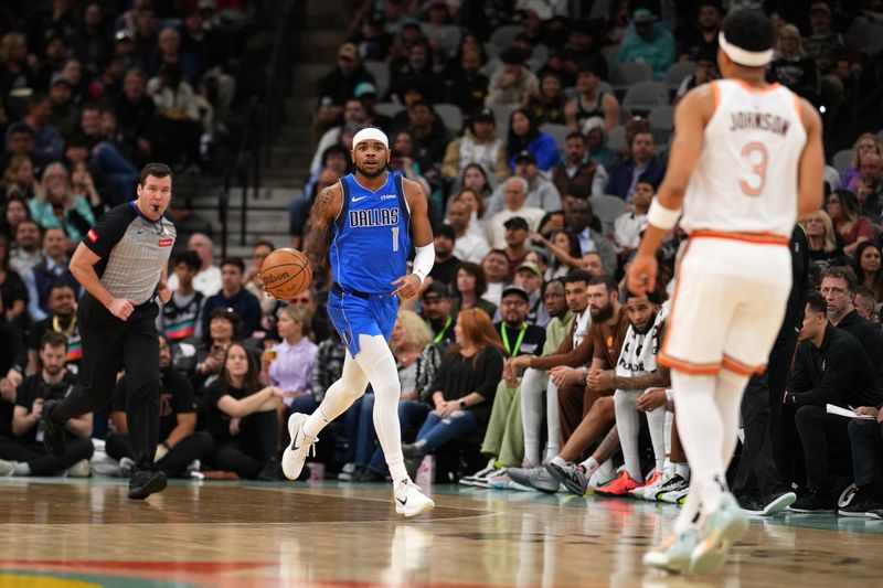 SAN ANTONIO, TX - MARCH 19: Jaden Hardy #1 of the Dallas Mavericks dribbles the ball during the game against the San Antonio Spurs on March 19, 2024 at the Frost Bank Center in San Antonio, Texas. NOTE TO USER: User expressly acknowledges and agrees that, by downloading and or using this photograph, user is consenting to the terms and conditions of the Getty Images License Agreement. Mandatory Copyright Notice: Copyright 2024 NBAE (Photos by Darren Carroll/NBAE via Getty Images)