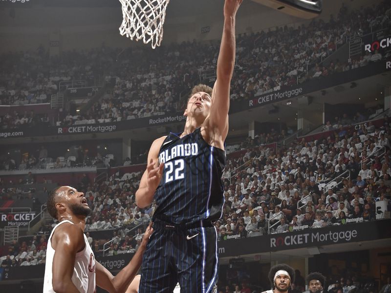 CLEVELAND, OH - APRIL 20: Franz Wagner #22 of the Orlando Magic drives to the basket during Round 1 Game 1 of the 2024 NBA Playoffs against the Cleveland Cavaliers on April 20, 2024 at Rocket Mortgage FieldHouse in Cleveland, Ohio. NOTE TO USER: User expressly acknowledges and agrees that, by downloading and/or using this Photograph, user is consenting to the terms and conditions of the Getty Images License Agreement. Mandatory Copyright Notice: Copyright 2024 NBAE (Photo by David Liam Kyle/NBAE via Getty Images)