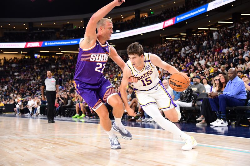 LOS ANGELES, CA - OCTOBER 6: Austin Reaves #15 of the Los Angeles Lakers drives to the basket during the game against the Phoenix Suns on October 6, 2024 at Acrisure Arena in Palm Springs, California. NOTE TO USER: User expressly acknowledges and agrees that, by downloading and/or using this Photograph, user is consenting to the terms and conditions of the Getty Images License Agreement. Mandatory Copyright Notice: Copyright 2024 NBAE (Photo by Adam Pantozzi/NBAE via Getty Images)