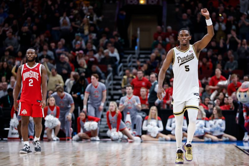 Mar 11, 2023; Chicago, IL, USA; Purdue Boilermakers guard Brandon Newman (5) celebrates teams win against the Ohio State Buckeyes at United Center. Mandatory Credit: Kamil Krzaczynski-USA TODAY Sports