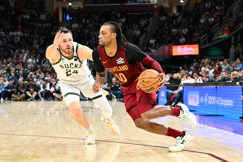 CLEVELAND, OHIO - NOVEMBER 04: Darius Garland #10 of the Cleveland Cavaliers goes to the basket around Pat Connaughton #24 of the Milwaukee Bucks during the fourth quarter at Rocket Mortgage Fieldhouse on November 04, 2024 in Cleveland, Ohio. The Cavaliers defeated the Bucks 116-114. NOTE TO USER: User expressly acknowledges and agrees that, by downloading and or using this photograph, User is consenting to the terms and conditions of the Getty Images License Agreement. (Photo by Jason Miller/Getty Images)