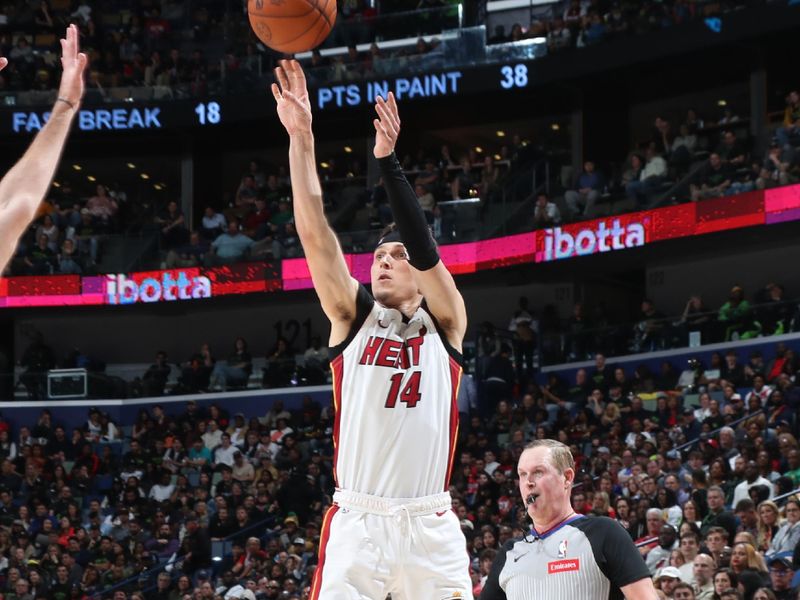 NEW ORLEANS, LA - FEBRUARY 23: Tyler Herro #14 of the Miami Heat shoots a three point basket during the game against the New Orleans Pelicans on February 23, 2024 at the Smoothie King Center in New Orleans, Louisiana. NOTE TO USER: User expressly acknowledges and agrees that, by downloading and or using this Photograph, user is consenting to the terms and conditions of the Getty Images License Agreement. Mandatory Copyright Notice: Copyright 2024 NBAE (Photo by Layne Murdoch Jr./NBAE via Getty Images)