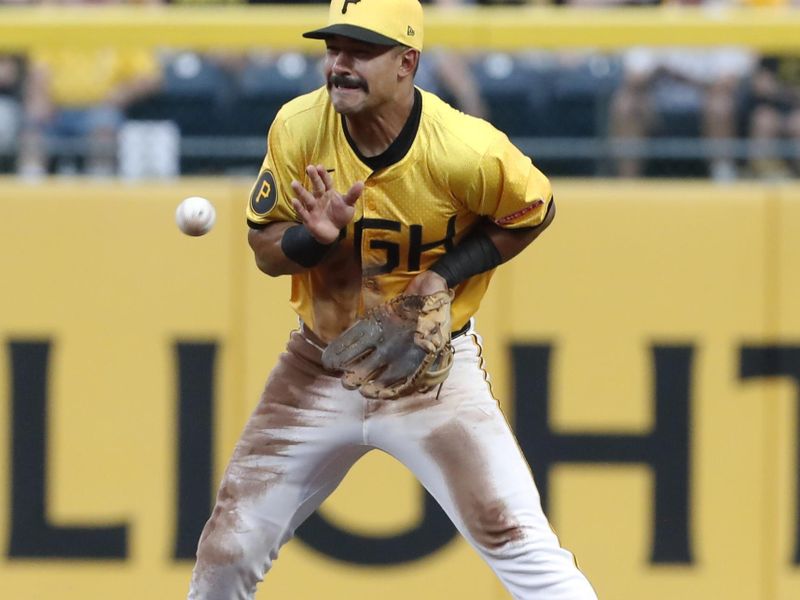 Jul 5, 2024; Pittsburgh, Pennsylvania, USA;  Pittsburgh Pirates second baseman Nick Gonzales (39) fields a ground ball for an out against the New York Mets during the fourth inning at PNC Park. Mandatory Credit: Charles LeClaire-USA TODAY Sports