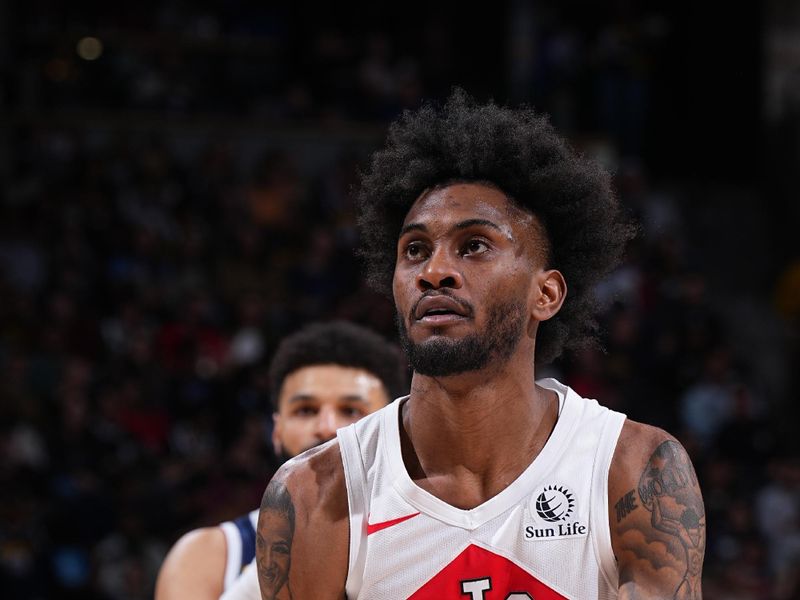 DENVER, CO - MARCH 11: Jalen McDaniels #2 of the Toronto Raptors prepares to shoot a free throw during the game against the Denver Nuggets on March 11, 2024 at the Ball Arena in Denver, Colorado. NOTE TO USER: User expressly acknowledges and agrees that, by downloading and/or using this Photograph, user is consenting to the terms and conditions of the Getty Images License Agreement. Mandatory Copyright Notice: Copyright 2024 NBAE (Photo by Garrett Ellwood/NBAE via Getty Images)