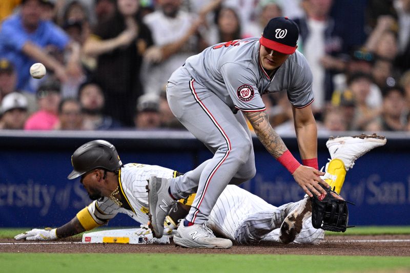 Jun 25, 2024; San Diego, California, USA; San Diego Padres first baseman Luis Arraez (4) slides into third base safely past Washington Nationals third baseman Nick Senzel (13) after hitting a triple during the fifth inning at Petco Park. Mandatory Credit: Orlando Ramirez-USA TODAY Sports