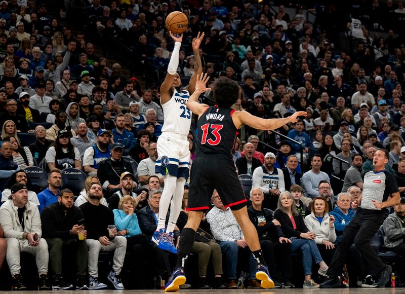 MINNEAPOLIS, MINNESOTA - APRIL 3: Monte Morris #23 of the Minnesota Timberwolves shoots a three point shot over defender Jordan Nwora #13 of the Toronto Raptors at the end of the third quarter at Target Center on April 3, 2024 in Minneapolis, Minnesota. NOTE TO USER: User expressly acknowledges and agrees that, by downloading and or using this photograph, User is consenting to the terms and conditions of the Getty Images License Agreement. (Photo by Stephen Maturen/Getty Images)