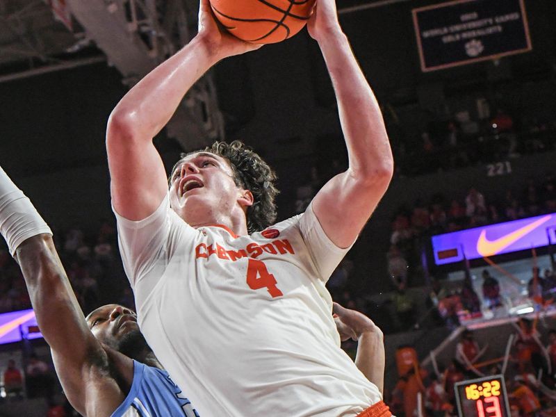 Jan 6, 2024; Clemson, South Carolina, USA; Clemson junior forward Ian Schieffelin (4) shoots the ball against North Carolina at Littlejohn Coliseum. Mandatory Credit: Ken Ruinard-USA TODAY Sports