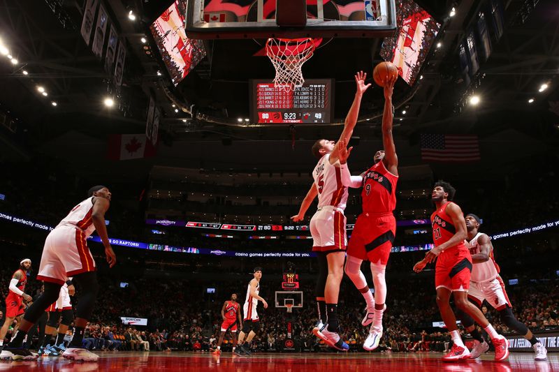 TORONTO, CANADA - JANUARY 17: RJ Barrett #9 of the Toronto Raptors drives to the basket during the game against the Miami Heat on January 17, 2024 at the Scotiabank Arena in Toronto, Ontario, Canada.  NOTE TO USER: User expressly acknowledges and agrees that, by downloading and or using this Photograph, user is consenting to the terms and conditions of the Getty Images License Agreement.  Mandatory Copyright Notice: Copyright 2024 NBAE (Photo by Vaughn Ridley/NBAE via Getty Images)