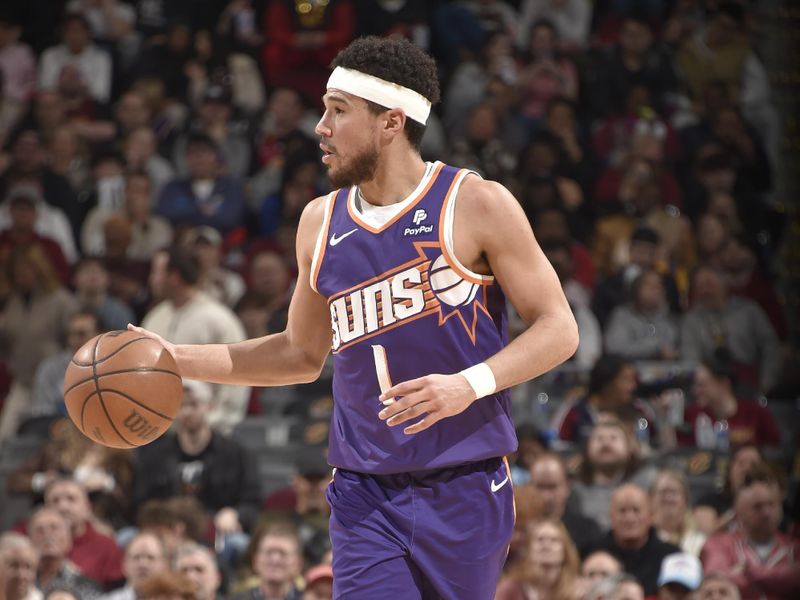 CLEVELAND, OH - MARCH 11: Devin Booker #1 of the Phoenix Suns handles the ball during the game against the Cleveland Cavaliers on March 11, 2024 at Rocket Mortgage FieldHouse in Cleveland, Ohio. NOTE TO USER: User expressly acknowledges and agrees that, by downloading and/or using this Photograph, user is consenting to the terms and conditions of the Getty Images License Agreement. Mandatory Copyright Notice: Copyright 2024 NBAE (Photo by David Liam Kyle/NBAE via Getty Images)