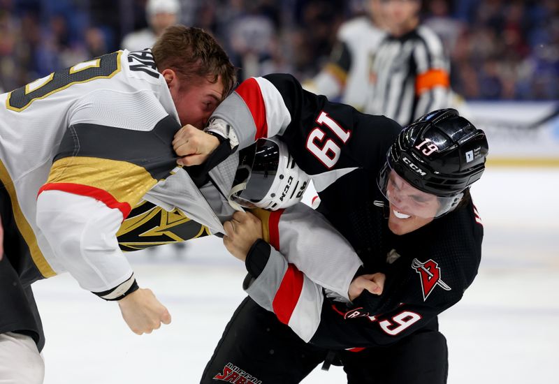 Mar 2, 2024; Buffalo, New York, USA;  Vegas Golden Knights center Ivan Barbashev (49) and Buffalo Sabres center Peyton Krebs (19) fight during the third period at KeyBank Center. Mandatory Credit: Timothy T. Ludwig-USA TODAY Sports