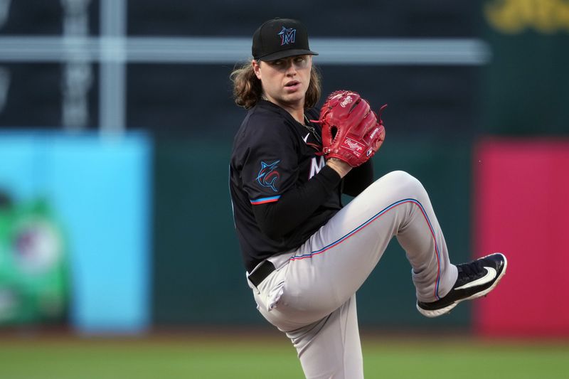 May 3, 2024; Oakland, California, USA; Miami Marlins starting pitcher Ryan Weathers (60) throws a pitch against the Oakland Athletics during the first inning at Oakland-Alameda County Coliseum. Mandatory Credit: Darren Yamashita-USA TODAY Sports