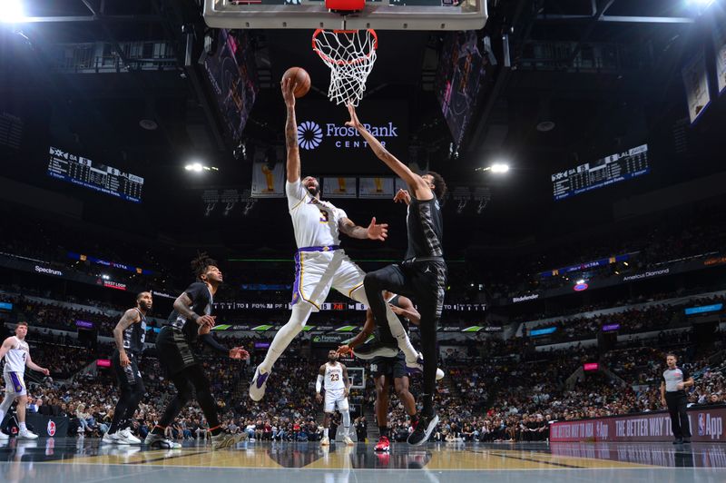 SAN ANTONIO, TX - OCTOBER 22:  Anthony Davis #3 of the Los Angeles Lakers shoots the ball during the NBA Cup game against the San Antonio Spurs on October 22, 2024 at the Frost Bank Center in San Antonio, Texas. NOTE TO USER: User expressly acknowledges and agrees that, by downloading and or using this photograph, user is consenting to the terms and conditions of the Getty Images License Agreement. Mandatory Copyright Notice: Copyright 2024 NBAE (Photos by Michael Gonzales/NBAE via Getty Images)