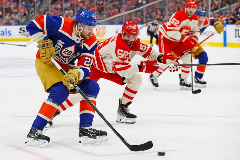 Feb 24, 2024; Edmonton, Alberta, CAN; Edmonton Oilers forward Leon Draisaitl (29) carries the puck around Calgary Flames defensemen Oliver Kylington (58) during the first period at Rogers Place. Mandatory Credit: Perry Nelson-USA TODAY Sports