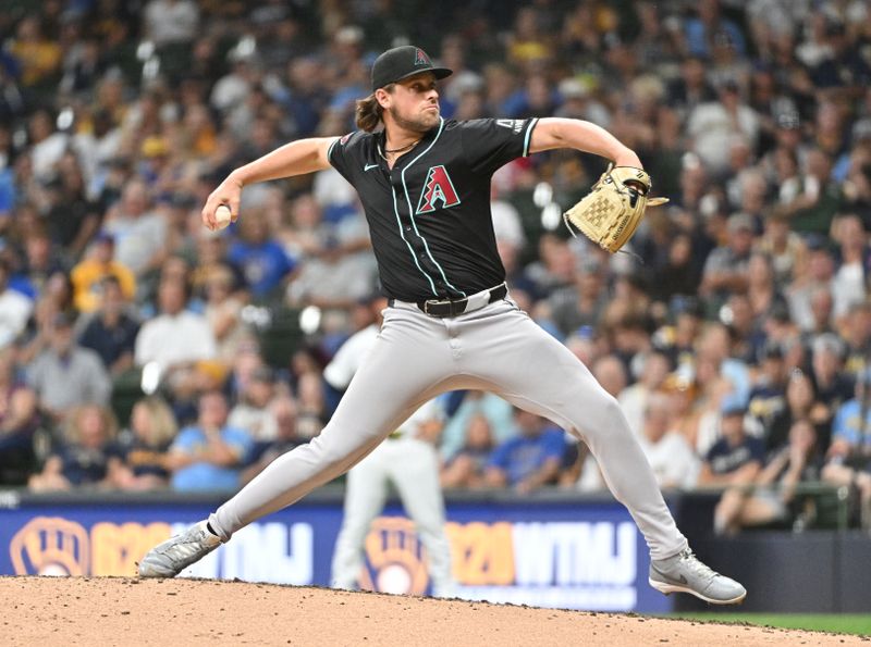 Sep 21, 2024; Milwaukee, Wisconsin, USA; Arizona Diamondbacks pitcher Kevin Ginkel (37) delivers a pitch against the Milwaukee Brewers at American Family Field. Mandatory Credit: Michael McLoone-Imagn Images