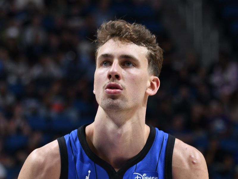 ORLANDO, FL - APRIL 1: Franz Wagner #22 of the Orlando Magic shoots a free throw during the game against the Portland Trail Blazers on April 1, 2024 at Kia Center in Orlando, Florida. NOTE TO USER: User expressly acknowledges and agrees that, by downloading and or using this photograph, User is consenting to the terms and conditions of the Getty Images License Agreement. Mandatory Copyright Notice: Copyright 2024 NBAE (Photo by Fernando Medina/NBAE via Getty Images)