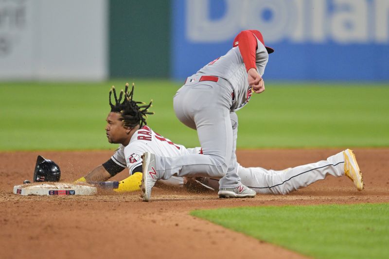 May 26, 2023; Cleveland, Ohio, USA; Cleveland Guardians third baseman Jose Ramirez (11) is caught stealing by St. Louis Cardinals shortstop Paul DeJong (11) during the eighth inning at Progressive Field. Mandatory Credit: Ken Blaze-USA TODAY Sports