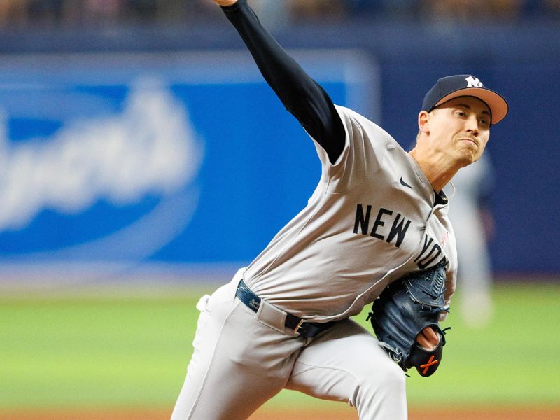 May 12, 2024; St. Petersburg, Florida, USA;  New York Yankees pitcher Luke Weaver (30) throws a pitch against the Tampa Bay Rays in the seventh inning at Tropicana Field. Mandatory Credit: Nathan Ray Seebeck-USA TODAY Sports