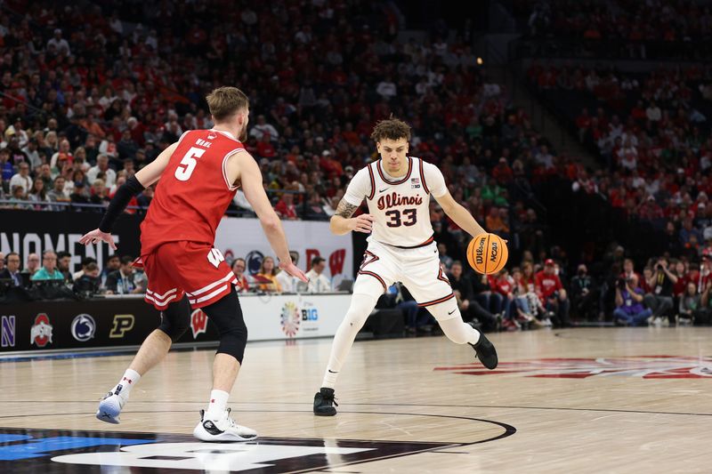 Mar 17, 2024; Minneapolis, MN, USA; Illinois Fighting Illini forward Coleman Hawkins (33) dribbles the ball defended by Illinois Fighting Illini guard AJ Redd (5) in the second half at Target Center. Mandatory Credit: Matt Krohn-USA TODAY Sports