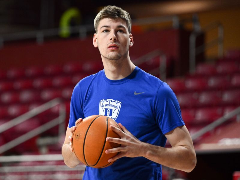 Jan 7, 2023; Chestnut Hill, Massachusetts, USA; Duke Blue Devils center Kyle Filipowski (30) during warmups before a game against the Boston College Eagles at the Conte Forum. Mandatory Credit: Brian Fluharty-USA TODAY Sports