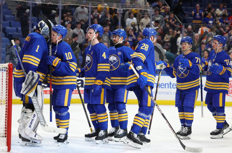 Apr 5, 2024; Buffalo, New York, USA;  The Buffalo Sabres celebrate a win over the Philadelphia Flyers at KeyBank Center. Mandatory Credit: Timothy T. Ludwig-USA TODAY Sports