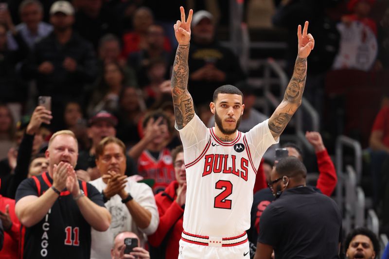 CHICAGO, ILLINOIS - OCTOBER 16: Lonzo Ball #2 of the Chicago Bulls acknowledges the crowd as he enters the preseason game against the Minnesota Timberwolves at the United Center on October 16, 2024 in Chicago, Illinois. NOTE TO USER: User expressly acknowledges and agrees that, by downloading and or using this photograph, User is consenting to the terms and conditions of the Getty Images License Agreement.  (Photo by Michael Reaves/Getty Images)