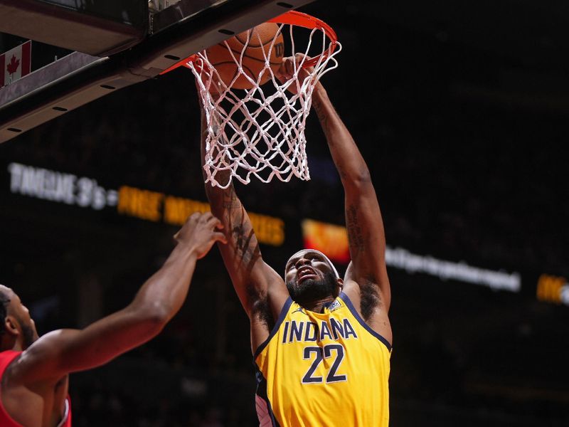 TORONTO, CANADA - FEBRUARY 14: Isaiah Jackson #22 of the Indiana Pacers dunks the ball during the game against the Toronto Raptors on February 14, 2024 at the Scotiabank Arena in Toronto, Ontario, Canada.  NOTE TO USER: User expressly acknowledges and agrees that, by downloading and or using this Photograph, user is consenting to the terms and conditions of the Getty Images License Agreement.  Mandatory Copyright Notice: Copyright 2024 NBAE (Photo by Mark Blinch/NBAE via Getty Images)