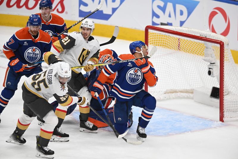May 10, 2025; Edmonton, Alberta, CAN; Edmonton Oilers defenceman Darnell Nurse (25) in front of  goalie Stuart Skinner (74)  with Vegas Golden Knights centre Brett Howden ( 21) and right winger Keegan Kolesar (55) during the second period in game three of the second round of the 2025 Stanley Cup Playoffs at Rogers Place. Mandatory Credit: Walter Tychnowicz-Imagn Images