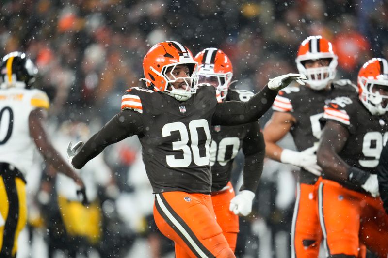 Cleveland Browns linebacker Devin Bush (30) reacts in the second half of an NFL football game against the Pittsburgh Steelers, Thursday, Nov. 21, 2024, in Cleveland. (AP Photo/Sue Ogrocki)