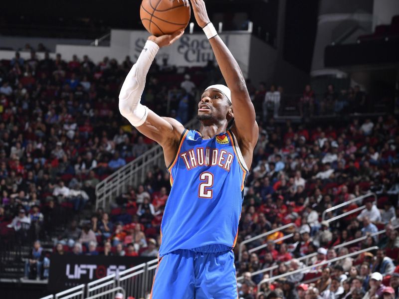 HOUSTON, TX - DECEMBER 1:  Shai Gilgeous-Alexander #2 of the Oklahoma City Thunder shoots the ball during the game against the Houston Rockets on December 1, 2024 at the Toyota Center in Houston, Texas. NOTE TO USER: User expressly acknowledges and agrees that, by downloading and or using this photograph, User is consenting to the terms and conditions of the Getty Images License Agreement. Mandatory Copyright Notice: Copyright 2024 NBAE (Photo by Logan Riely/NBAE via Getty Images)