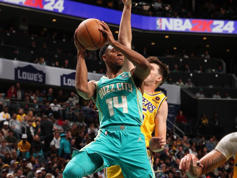 CHARLOTTE, NC - FEBRUARY 5: Ish Smith #14 of the Charlotte Hornets handles the ball during the game against the Los Angeles Lakers on February 5, 2024 at Spectrum Center in Charlotte, North Carolina. NOTE TO USER: User expressly acknowledges and agrees that, by downloading and or using this photograph, User is consenting to the terms and conditions of the Getty Images License Agreement. Mandatory Copyright Notice: Copyright 2024 NBAE (Photo by Kent Smith/NBAE via Getty Images)