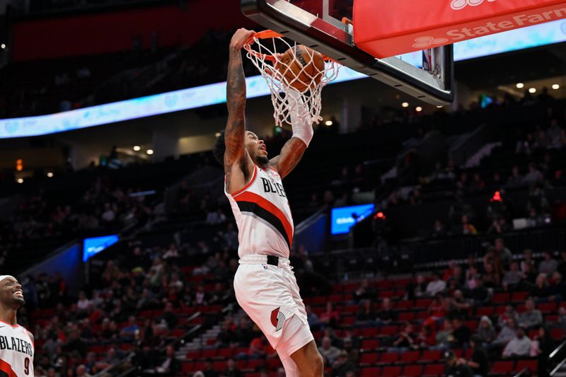 PORTLAND, OREGON - OCTOBER 18: Anfernee Simons #1 of the Portland Trail Blazers dunks the ball during the third quarter of the preseason game against the Utah Jazz at Moda Center on October 18, 2024 in Portland, Oregon. NOTE TO USER: User expressly acknowledges and agrees that, by downloading and or using this photograph, User is consenting to the terms and conditions of the Getty Images License Agreement. (Photo by Alika Jenner/Getty Images)