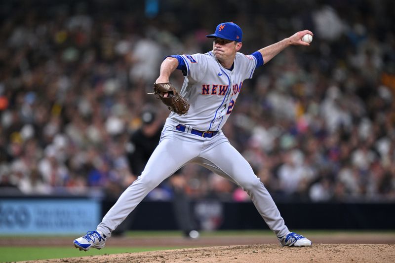 Jul 7, 2023; San Diego, California, USA; New York Mets relief pitcher Brooks Raley (25) throws a pitch against the San Diego Padres during the seventh inning at Petco Park. Mandatory Credit: Orlando Ramirez-USA TODAY Sports