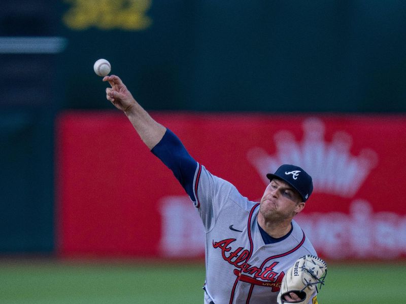 May 30, 2023; Oakland, California, USA;  Atlanta Braves starting pitcher Bryce Elder (55) delivers a pitch against the Oakland Athletics during the first inning at Oakland-Alameda County Coliseum. Mandatory Credit: Neville E. Guard-USA TODAY Sports