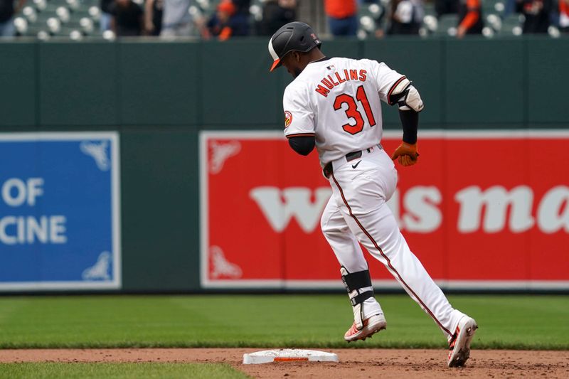 Apr 17, 2024; Baltimore, Maryland, USA; Baltimore Orioles outfielder Cedric Mullins (31) rounds the bases following his game winning two run home run in the ninth inning against the Minnesota Twins at Oriole Park at Camden Yards. Mandatory Credit: Mitch Stringer-USA TODAY Sports