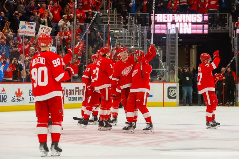 Jan 21, 2024; Detroit, Michigan, USA; The Detroit Red Wings celebrate their win against the Tampa Bay Lightning  at Little Caesars Arena. Mandatory Credit: Brian Bradshaw Sevald-USA TODAY Sports