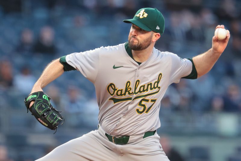 Apr 25, 2024; Bronx, New York, USA; Oakland Athletics starting pitcher Alex Wood (57) delivers a pitch during the first inning against the New York Yankees at Yankee Stadium. Mandatory Credit: Vincent Carchietta-USA TODAY Sports